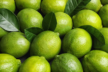 Fresh Ripe Juicy Limes As Background, Closeup