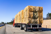Truck Transporting Bales Of Hay On A Freeway In Ventura County, South California