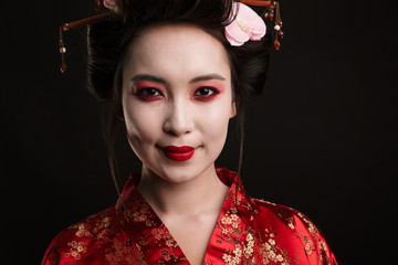 Poster - Image of happy geisha woman in traditional japanese kimono smiling