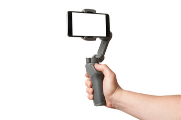 Man filming with a blank screen smartphone using a gimbal stabilizer, isolated on white background
