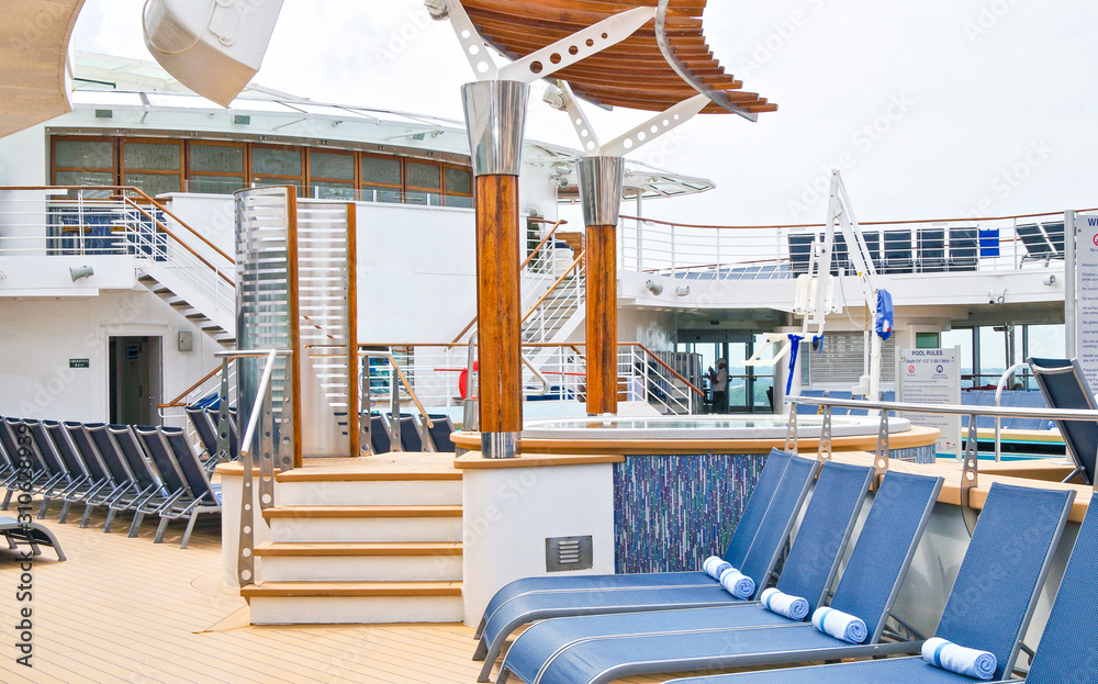 Sun Loungers and beds and chairs on Pool Deck of luxury Celebrity ...