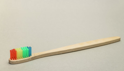 Aufkleber - Beautiful wooden  toothbrush  on a gray background.