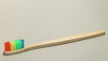 Aufkleber - Beautiful wooden  toothbrush  on a gray background.