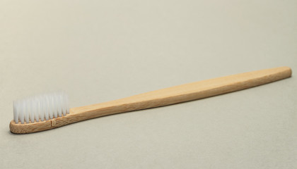 Aufkleber - Beautiful wooden  toothbrush  on a gray background.