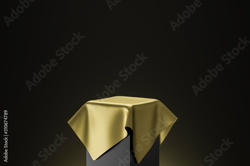 Fotografía Gold pedestal or podium display with golden satin fabric platform concept on dark background