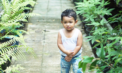 Wall Mural - Happy Little Asian baby boy 2 years old. child Healthy happy funny smiling face young toddler lovely kid concept. Asian kid laugh looking at camera portrait.                                           