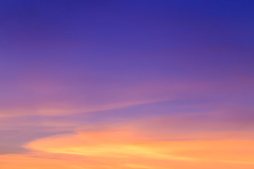 Wall Mural - Abstract fantasy twilight sunset background, Golden sunlight cloudy with colorful highlight on blue sky and softly clouds 