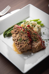 Wall Mural - meat loaf with mashed potato and asparagus