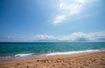 Wall Mural - Caucasian boy playing on the beach