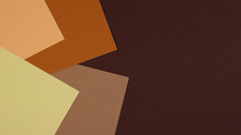 Abstract Geometric Paper Background In Earth Tone. Many Earth Tones Originate From Clay Earth Pigments, Such As Umber, Ochre, And Sienna.