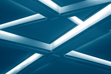 Poster - Computer graphics of abstract modern architecture of an office building interior resembling glowing girders. Technological background with angular geometric structure.