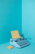 © Audrey Shtecinjo/Stocksy - Blue Office Typewriter