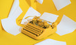© Audrey Shtecinjo/Stocksy - Yellow Office Typewriter