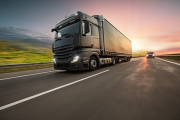 Wall Mural - Truck with container on highway, cargo transportation concept. Shaving effect.