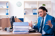© Elnur - Young handsome businessman sitting in the office