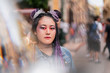 © Per Swantesson/Stocksy - blurry girl with purble box braids