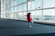 © MaaHoo Studio/Stocksy - Little girl dancing in airport terminal