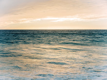 Landscape Of Ocean Waves At Sunset