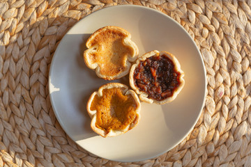 Trio of holiday tarts - pumpkin, mincemeat and butter tart