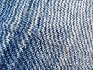 Denim background texture for design. Canvas denim texture. Blue denim that can be used as background. Blue jeans texture for any background. Denim jeans texture.