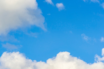 Wall Mural - Blue sky background with white clouds