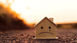© Zenzeta - Closeup mockup house wood with face sad emotion at sunset background. Minimal design. House construction and decorate concept.