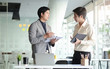 © wattana - Business working in office with documents and laptop people Consulting and business planning.