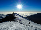 hikers on the ridge ascend mount kilimanjaro the tallest peak in africa.