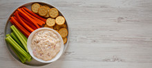 Homemade Pimento Cheese Dip With Carrots, Celery And Crackers Over White Wooden Background, Top View. Flat Lay, Overhead, From Above. Copy Space.