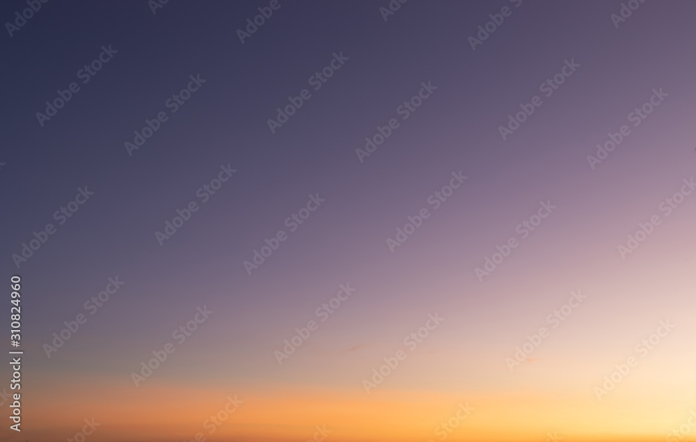 Heaven at early morning with copy space. Smooth orange blue gradient of dawn sky.Sunset, sunrise backdrop.Predawn clear sky with orange horizon and blue atmosphere.  Background of beginning of day. - obrazy, fototapety, plakaty 