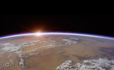 Wall Mural - observation of sunrise over the earth. view of planet earth from space.elements of this image furnis