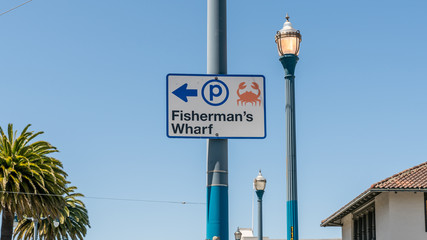 Wall Mural - Fisherman's Wharf road directional signage in San Francisco, California, United States of America.