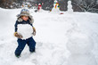 © Volodymyr - Cute kid - winter portrait. Winter scene with happy child on white snow background. Winter portrait of cute child in snow Garden.