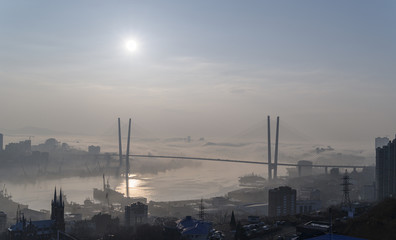 Fototapete - Vladivostok cityscape daylight view. Fog over the city.