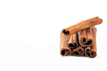 cinnamon sticks on white background