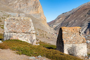 Wall Mural - View of medieval tombs in City of Dead near Eltyulbyu, Sunny Russia in autumn