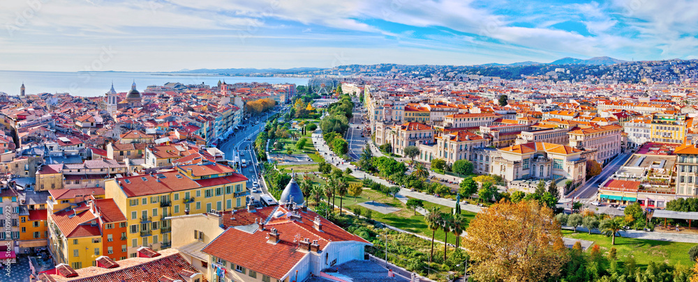 Nice, France - December 1, 2019: Colorful aerial panoramic view over the old town, with the famous Massena square and the Promenade du Paillon, from the roof of Saint Francis tower - obrazy, fototapety, plakaty 