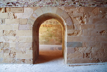 Old Door In Stone Wall