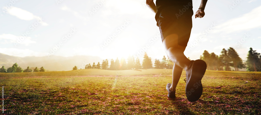 panoramic - man running marathon through the field - obrazy, fototapety, plakaty 