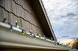 © Lost_in_the_Midwest - Hanging Christmas lights on gutter with plastic clips