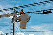 © Valmedia - Health and safety in the construction and maintenance industry as a workman is seen from below in a cherry picker by a utility pole