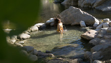 Girl Flipping Hair In Water