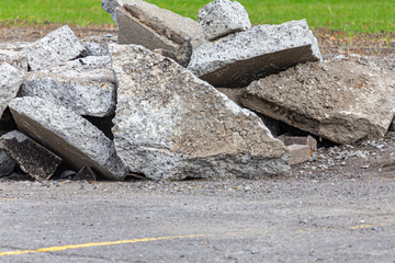 Dug-up Broken Pavement Fragments in a Parking Lot