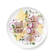 © Nelea Reazanteva - Salted herring with spices, lemon and red  onion rings isolated on white background. Marinated sliced fish. top view