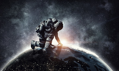 Wall Mural - astronaut starting to run. mixed media