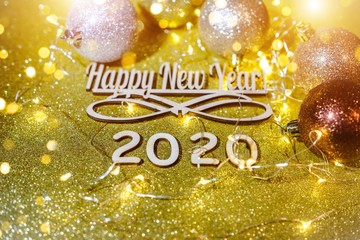 Happy new year 2020 on gold shiny background