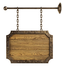 Wooden signboard hanging on chains. Isolated, clipping path included. 