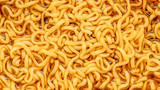 Fototapeta  - close up Noodle cup or instant noodles , noodle soup in a cup, with a view from above. macro photography texture background