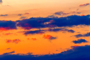 Wall Mural - orange sunset sky with clouds. beautiful nature background