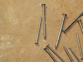 hammer and nails on wooden background